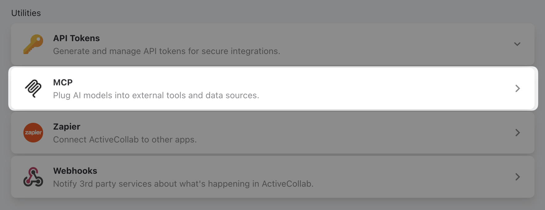 The Utilities section of the Apps & Integrations page, with the MCP entry highlighted between API Tokens and Zapier.